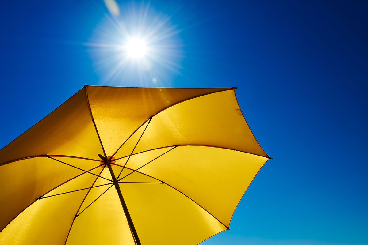 yellow umbrella in the sun