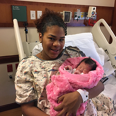 Zayra Ramos enjoys a quiet moment with Jayleen, who was the first baby born at Greenwich Hospital in 2017. 