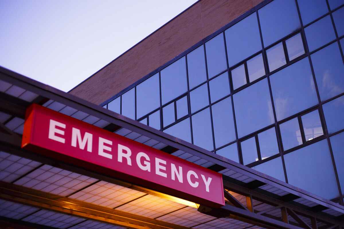 Emergency room sign on the exterior of a medical building